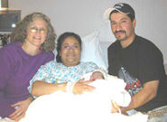 Mother holding newborn baby