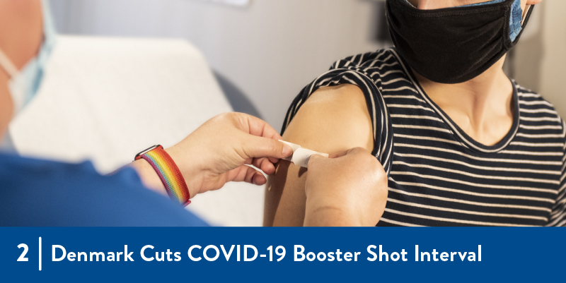 2 - Denmark Cuts COVID-19 Booster shot interval A person receiving a vaccination