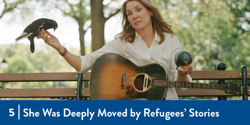 4 - She was deeply moved by refugees' stories A woman with guitar and birds