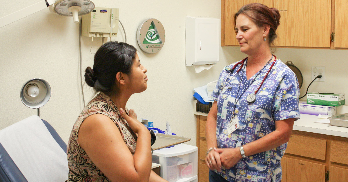 Patient talks with clinician