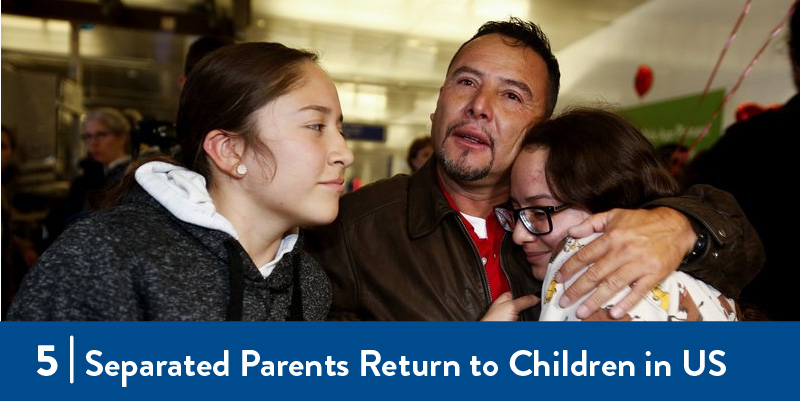 A parent is reunited with his family
