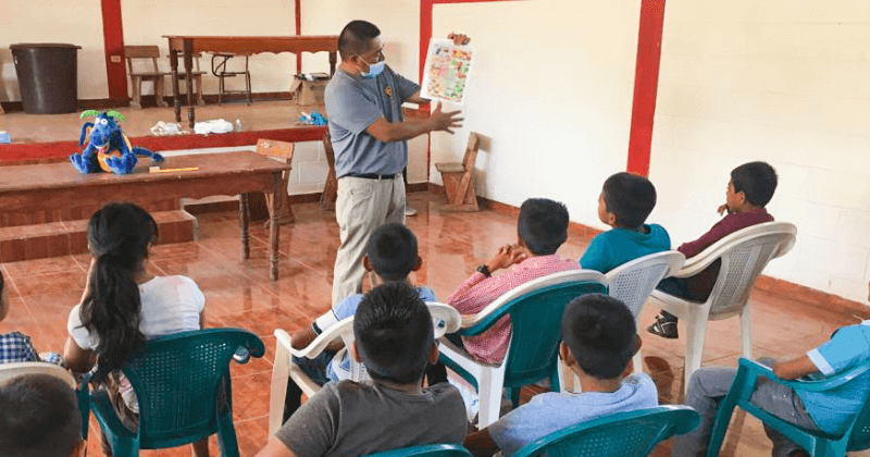 Teacher works with students in Honduras