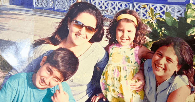 Camila and her family in an old family photo