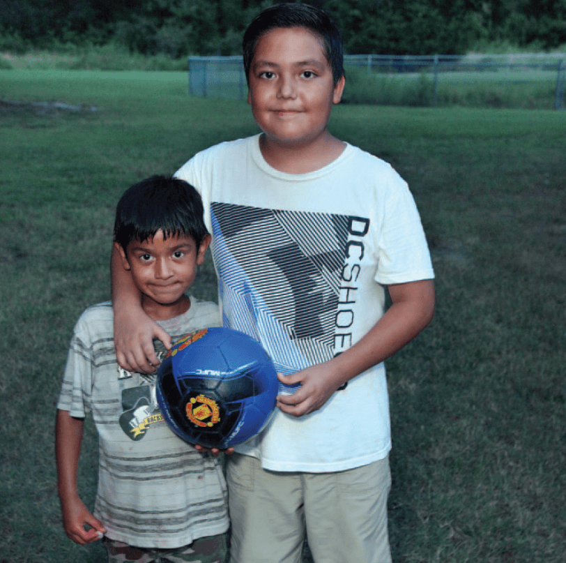 children with a soccer ball