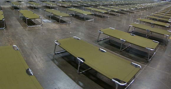 hundreds of empty cots