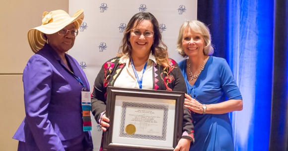 Patricia M. Juarez-Carillo receiving award