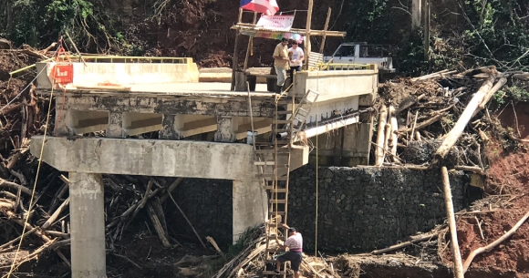 A bridge in Puerto Rico destroyed by Hurricane Maria