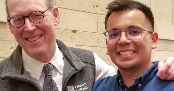 Dr. Paul Farmer with MCNâs Luis Retta at University of Texas in 2019.
