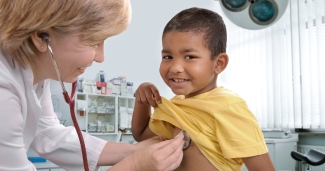 child getting checkup
