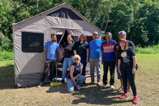 Marysel PagÃ¡n Santana with relief team members in Maricao