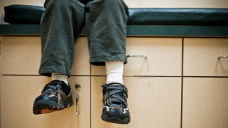Child sitting in a doctor's office